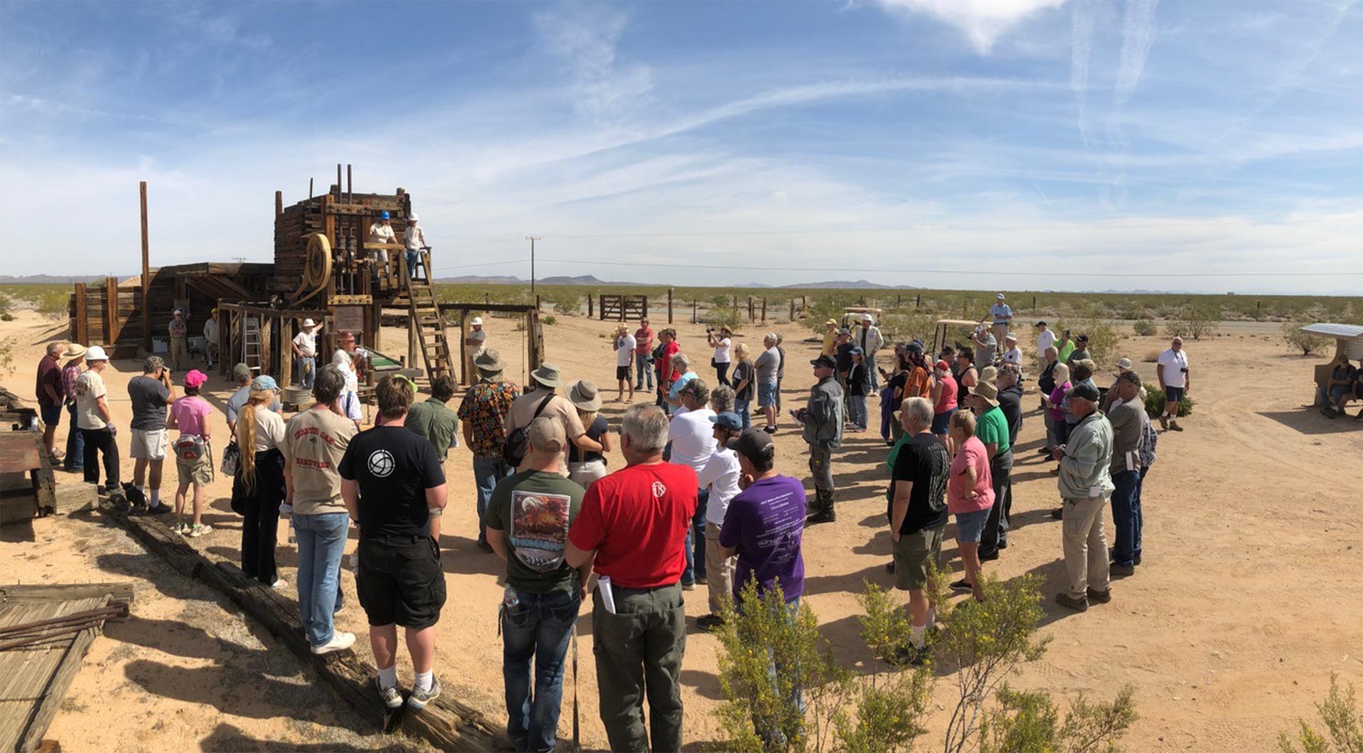 Mojave Road Rendezvous spectators watching the American Boy Stamp Mill in action