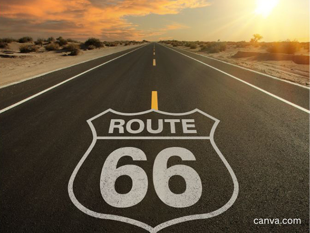 Route 66 shield painted on the road, photo taken at sunset. Canva.com