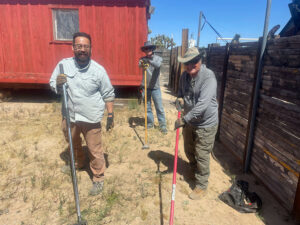 Anna and Jerry Sam Sumitani, Dale Wishner and Doug Shearer digging out invasive weeds.